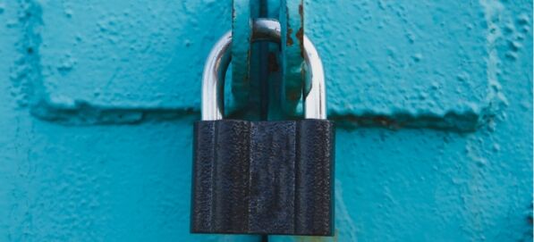 Image of lock on bright blue background